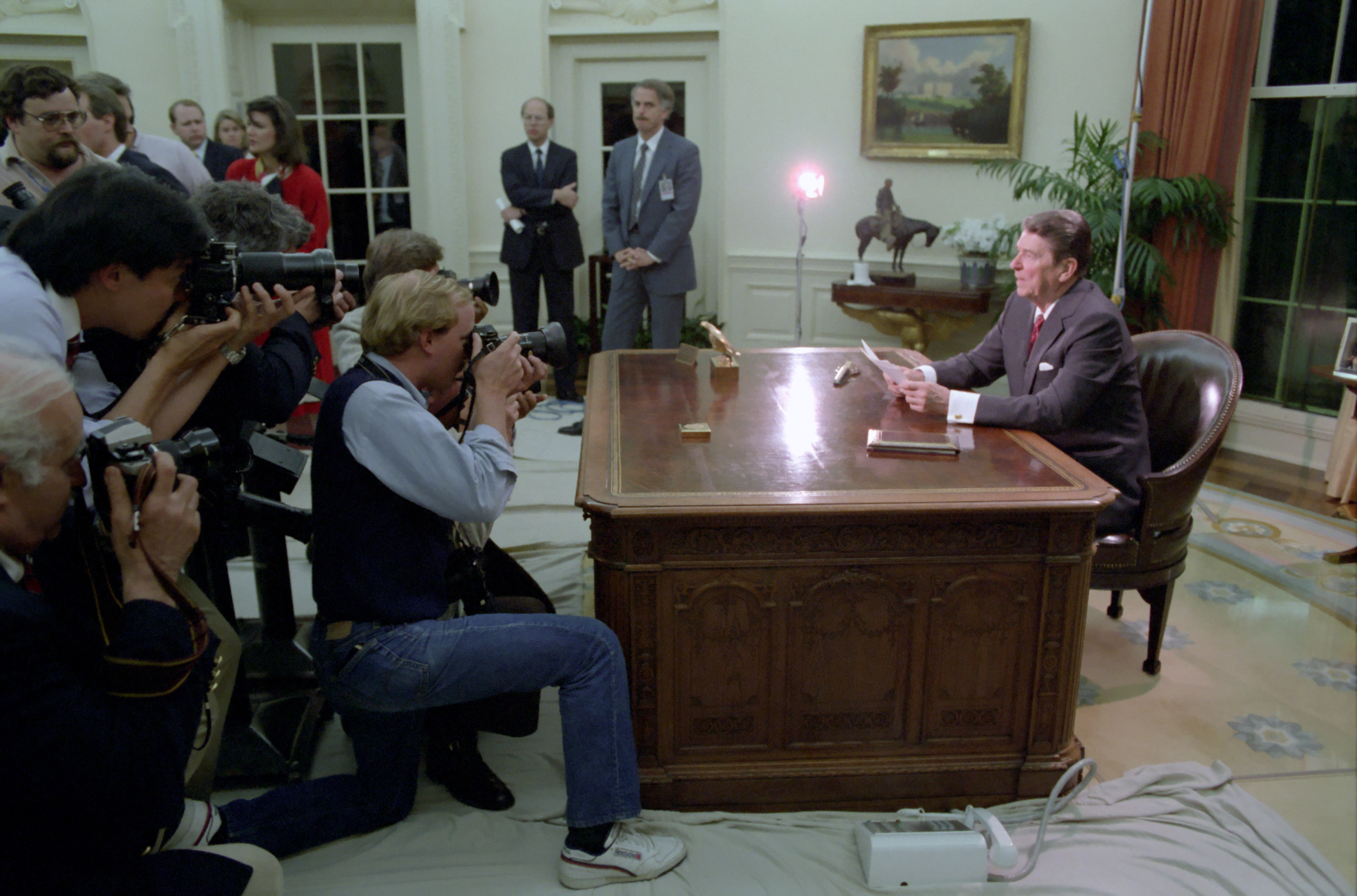 US President Ronald Reagan delivers an address from the Oval Office