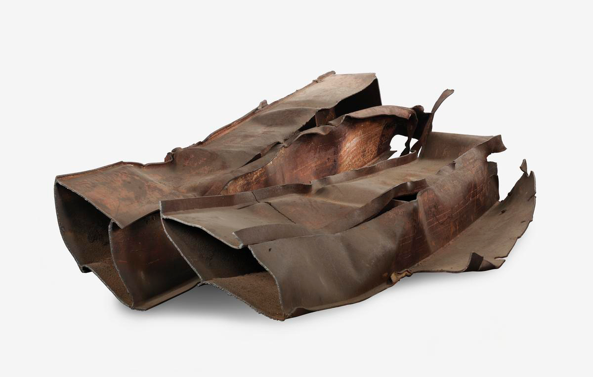 pieces of twisted and rusted steelwork from the collapsed World Trade Center, New York