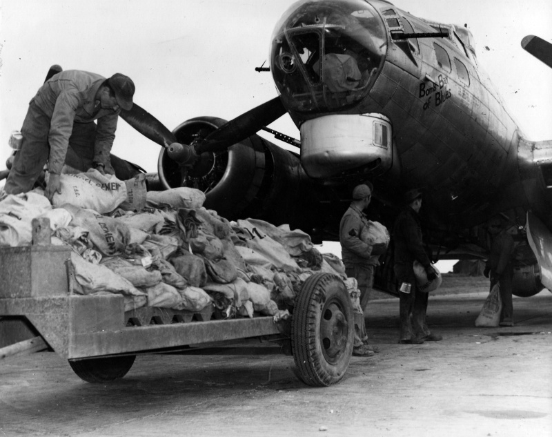 B-17 43-38285 'Bomb Bay of Blues' being loaded up for a 'Chowhound' mission.