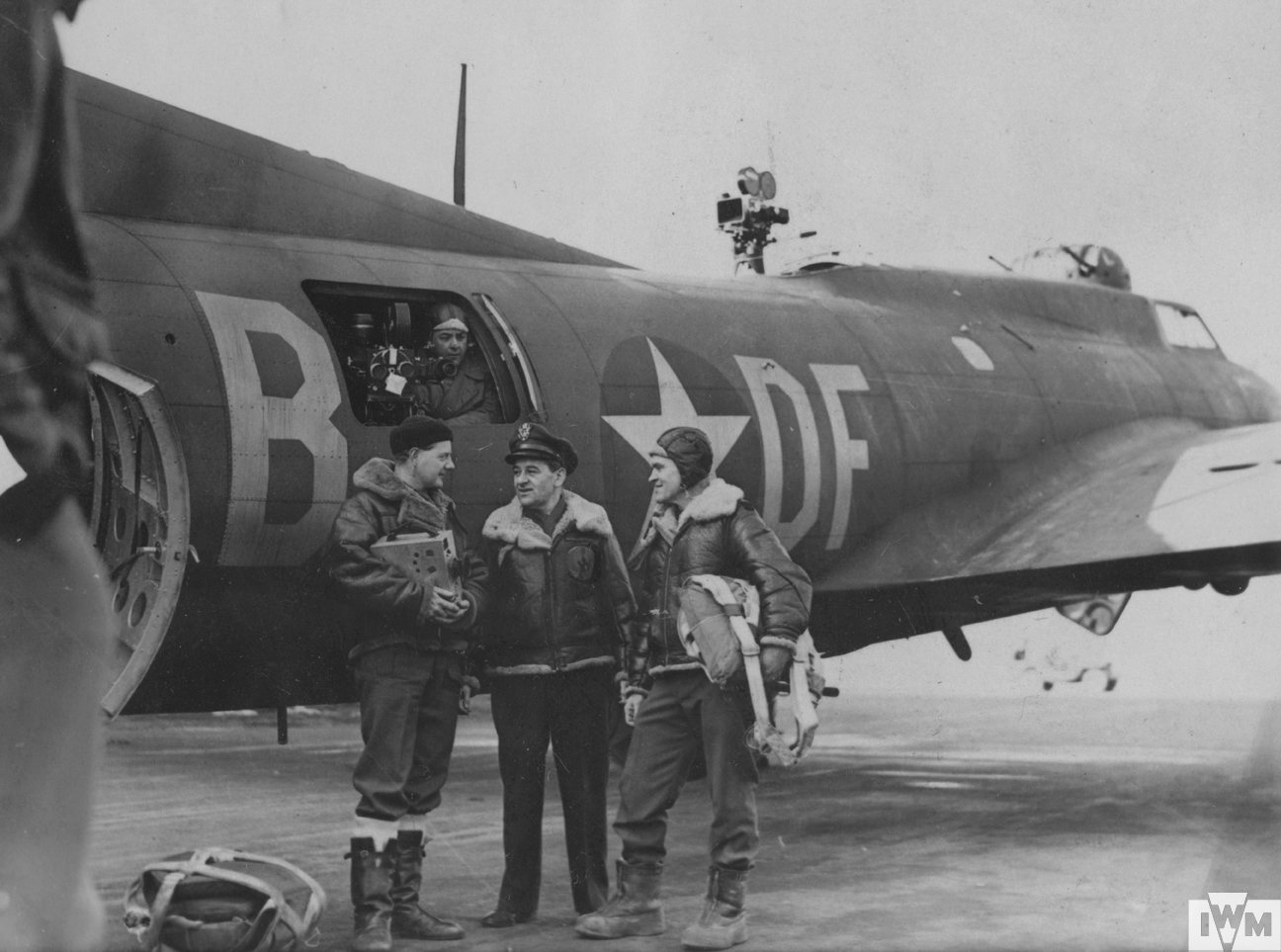 Filmmaker Major William Wyler with his production team while filming "Memphis Belle, A Story of a Flying Fortress" at Bassingbourn, 1943. 