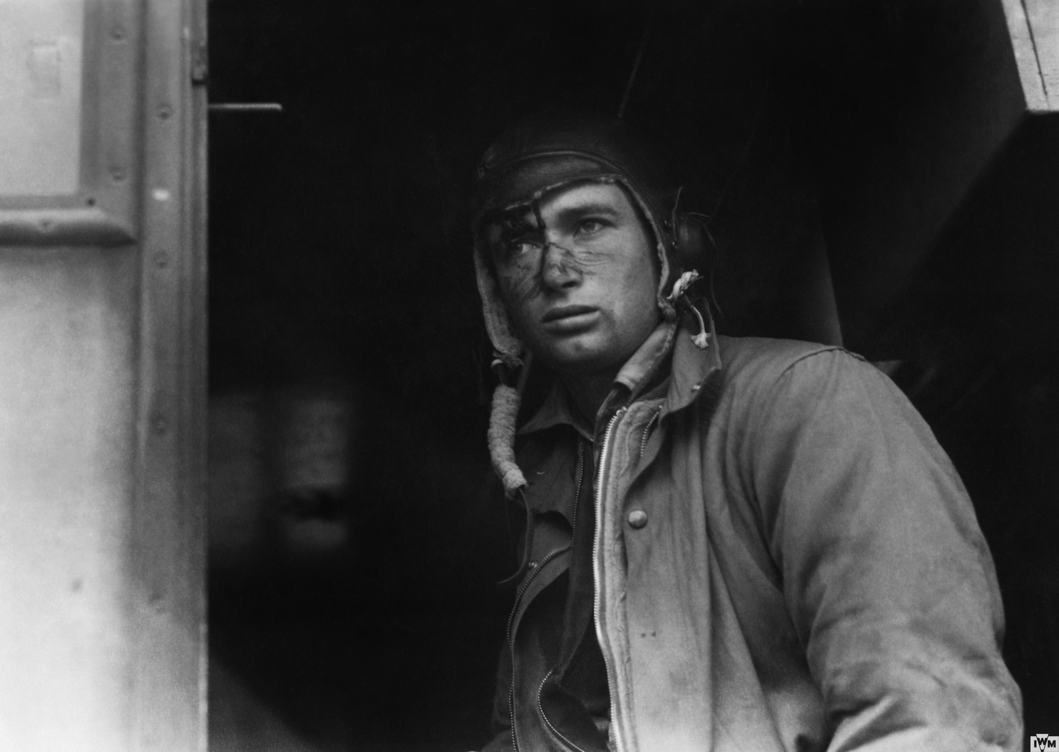 Staff Sergeant Jayson C Smart of the 305th Bomb Group with a cut brow, caused by a splinter during a mission over the Rhur, 12 August 1943