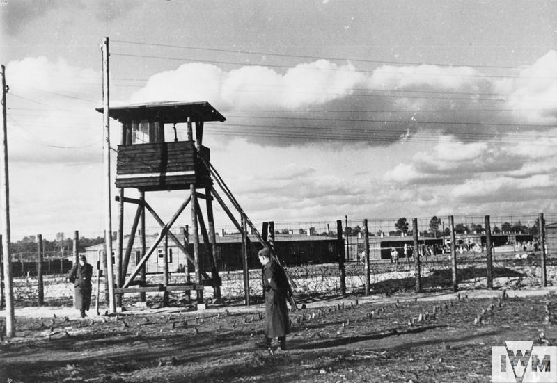 German guards on duty by one of the watch towers at Stalag Luft III, Sagan.