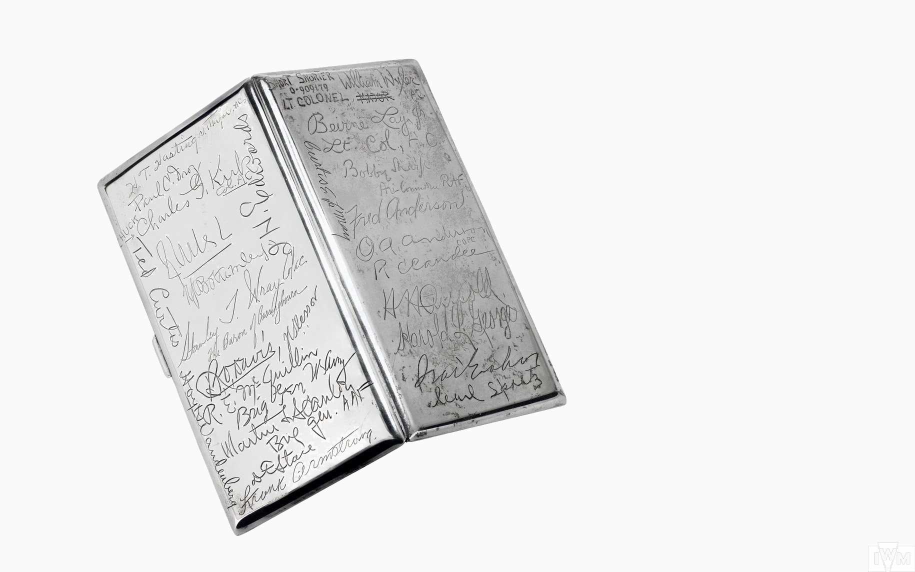 William Wyler’s Cigarette Case, signed by the crew of the ‘Memphis Belle’ and members of 8th Air Force High Command. His six combat missions are listed inside.  